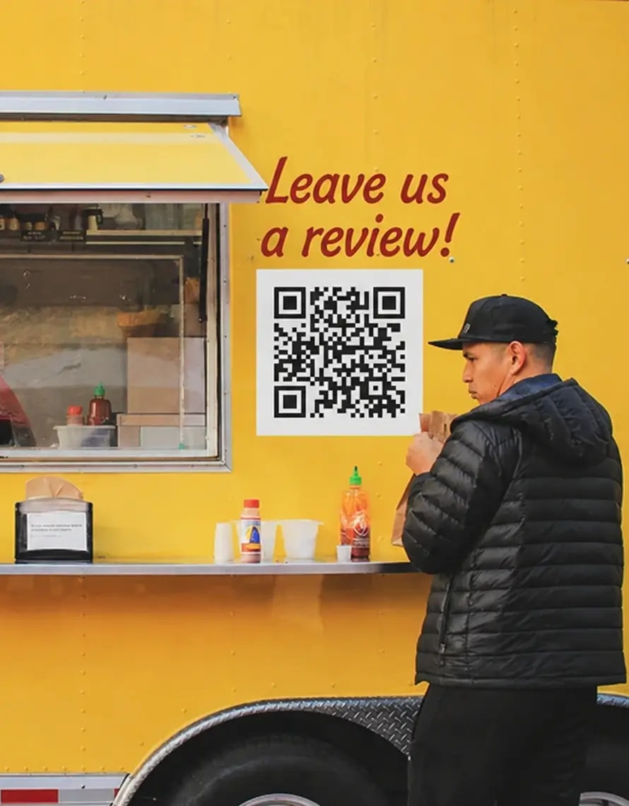 Customer leaving a review at a food truck