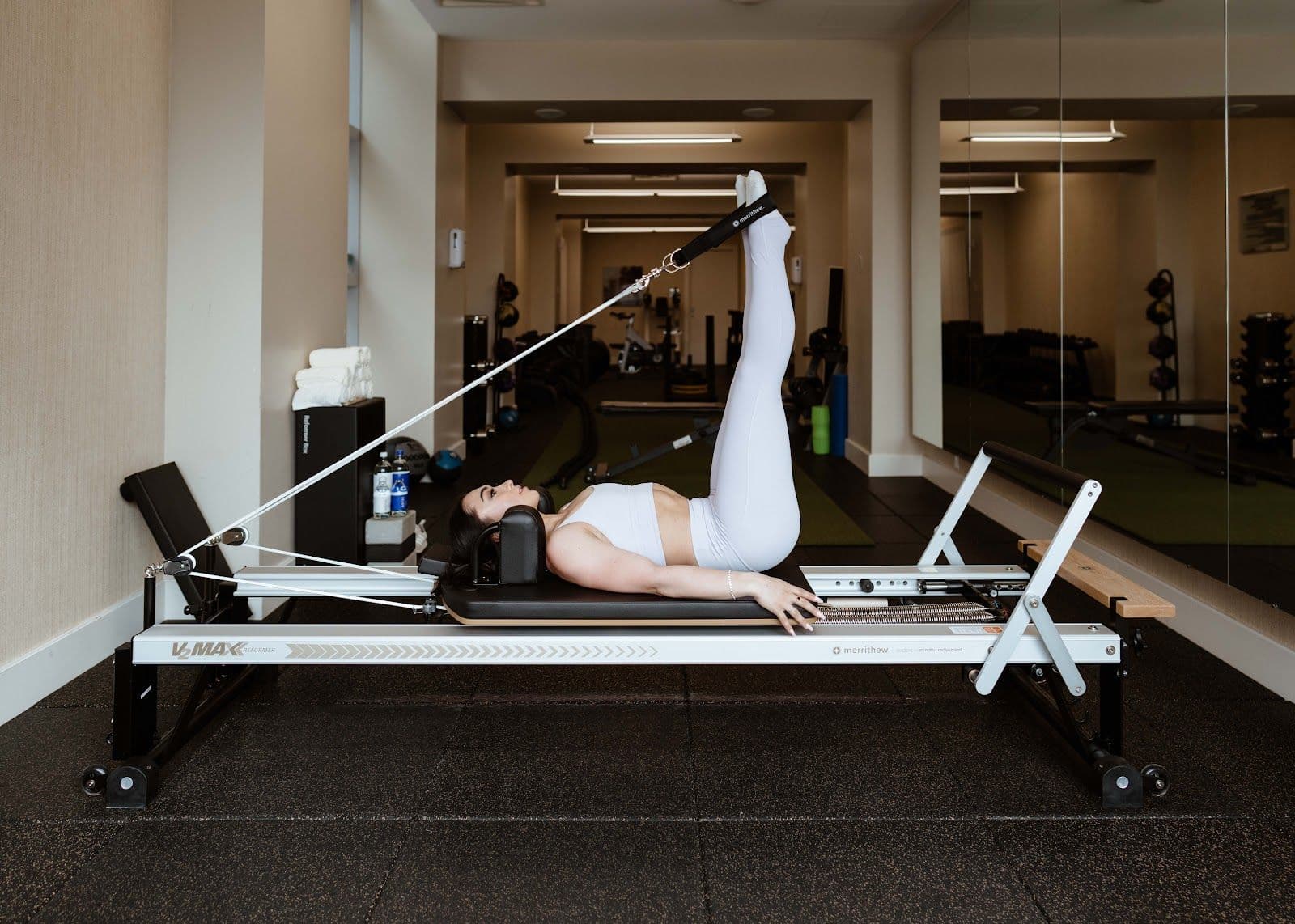 Innovative Fitness Toronto (Ritz-Carlton) team reviewing member feedback and Google reviews together at the front desk