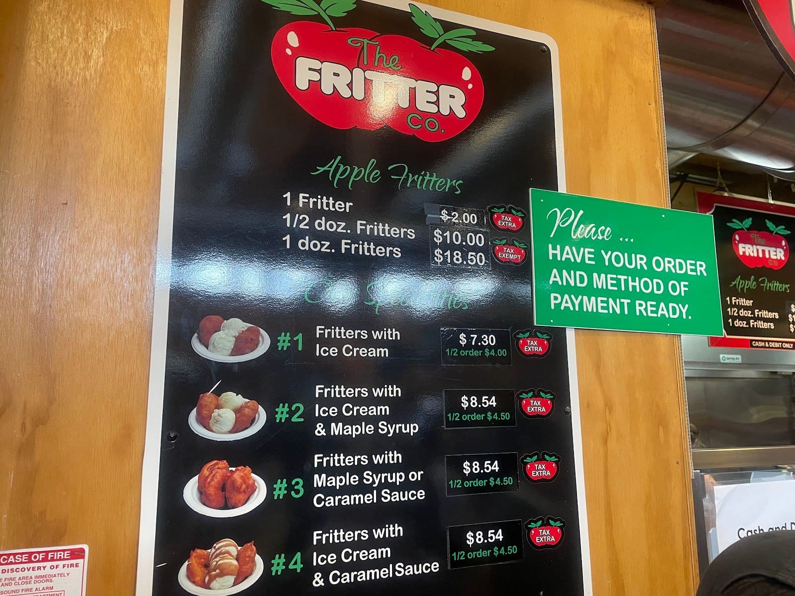 Restaurant team reviewing guest feedback at The Fritter Co.