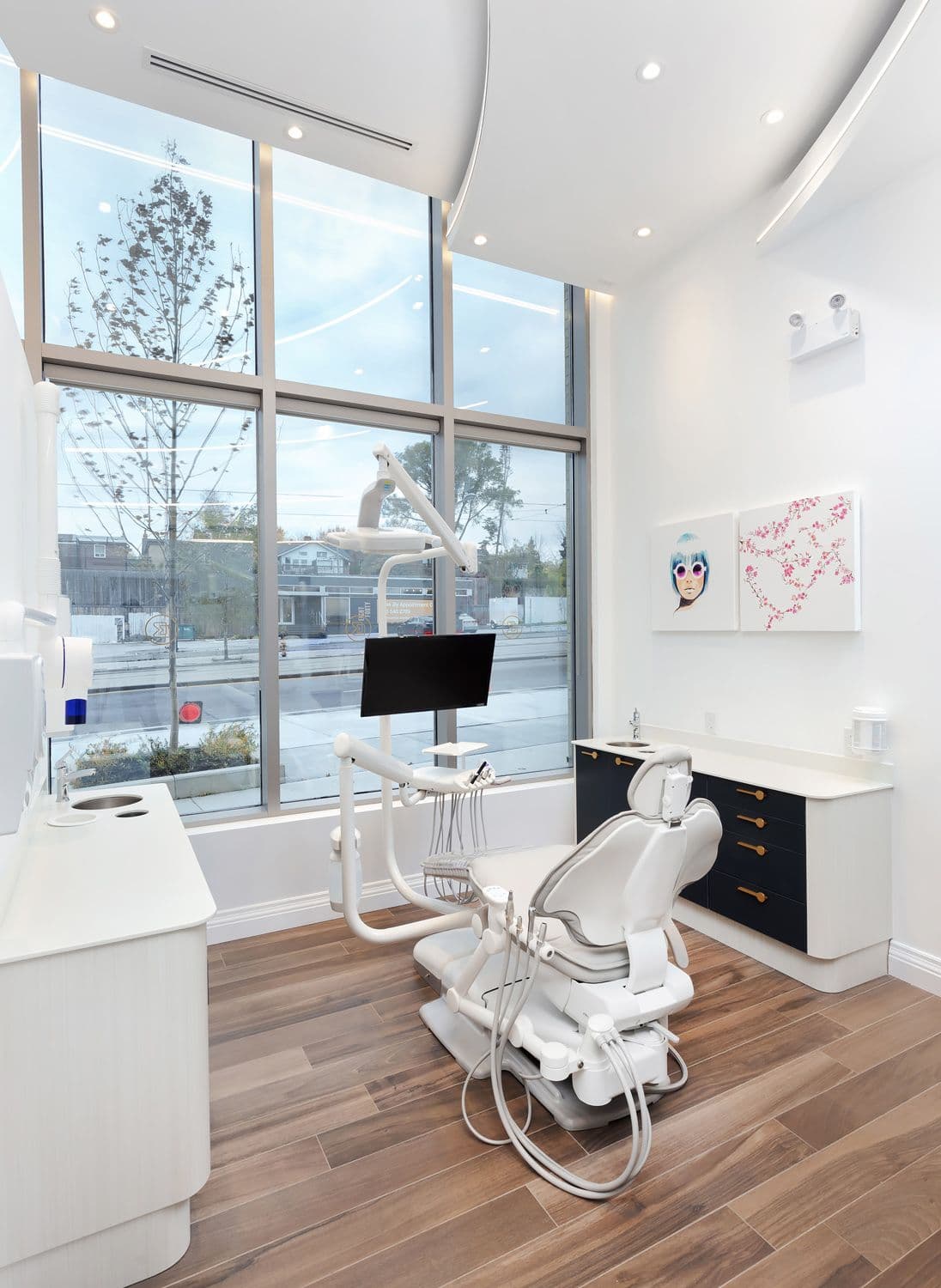 Bitehaus Toronto Dental Clinic team reviewing patient feedback together at the front desk