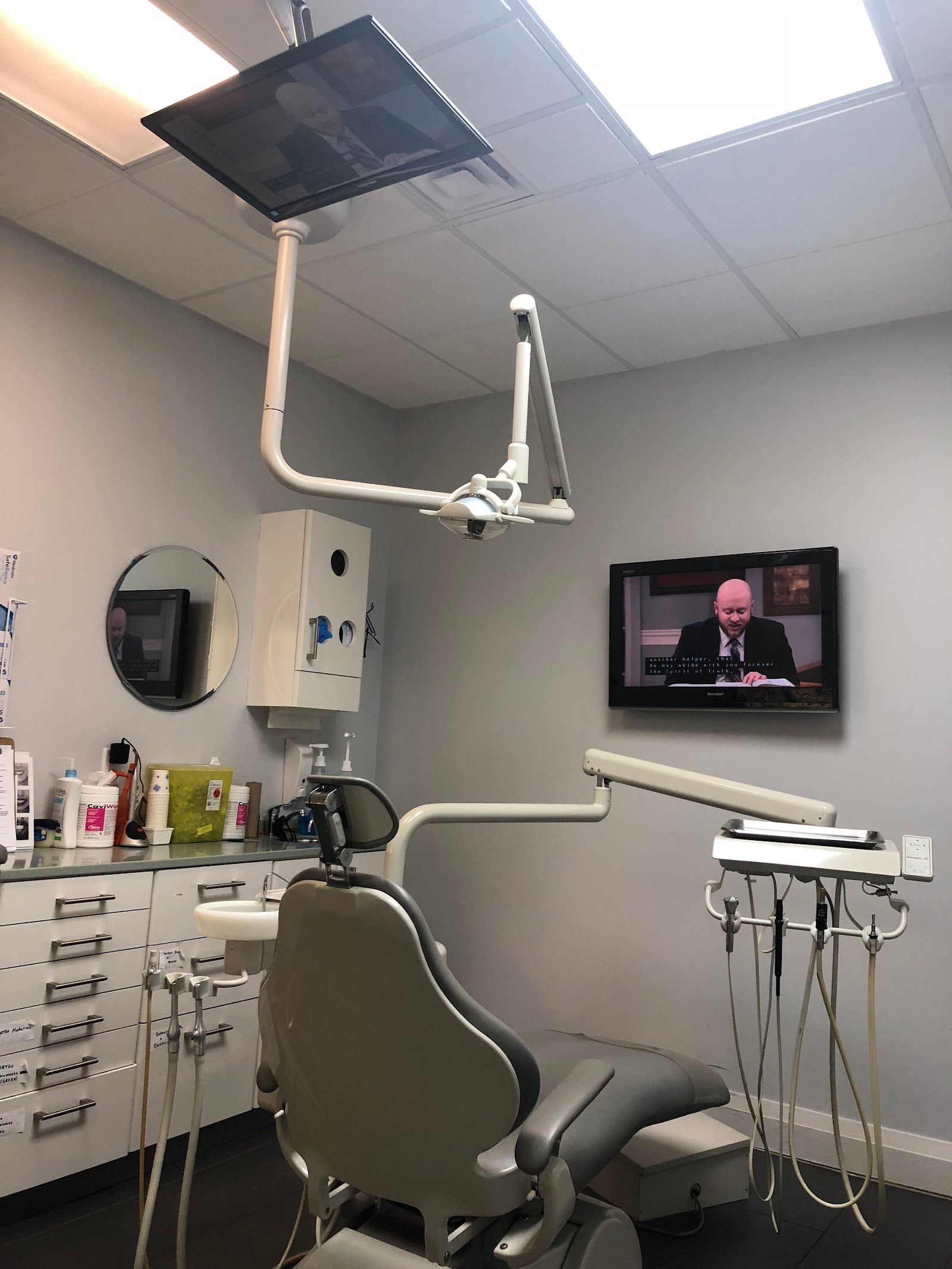 Doctor reviewing patient feedback on a laptop