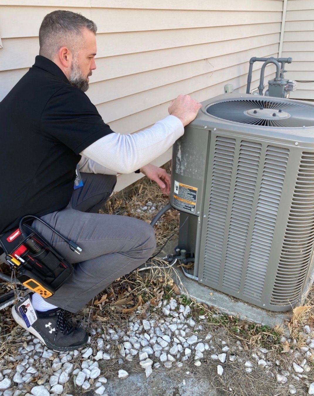 Home services owner reviewing feedback on a laptop