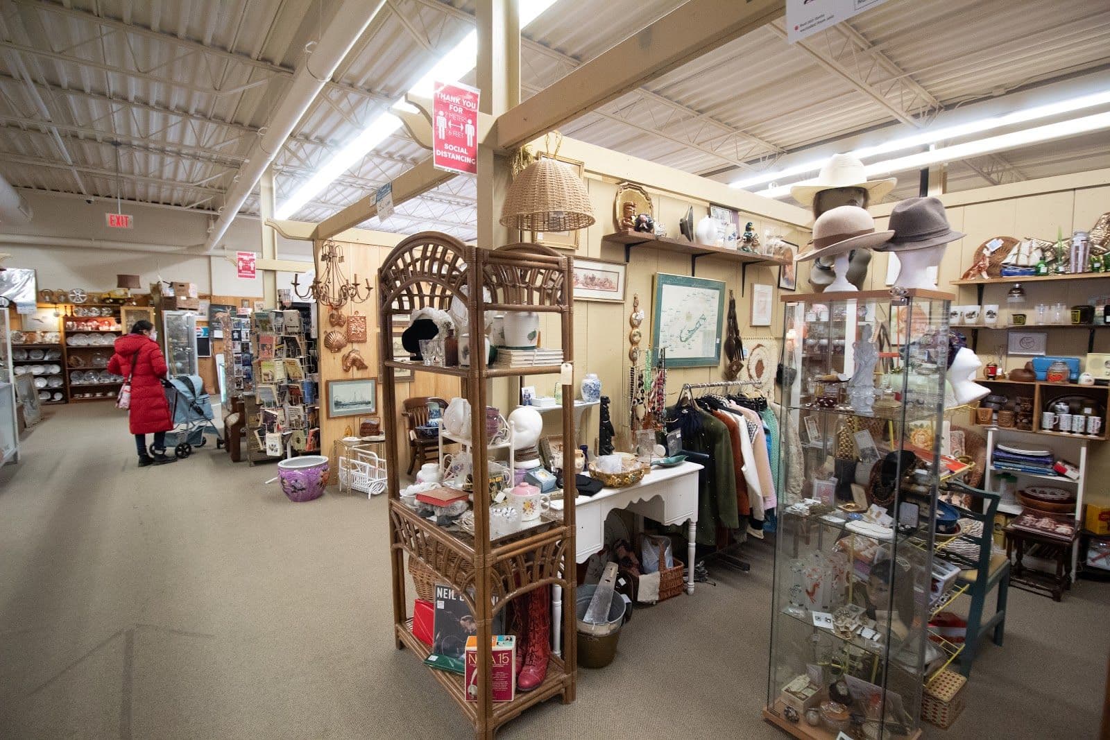 Market Road Antiques team reviewing Google guest feedback and review themes on a dashboard inside the store