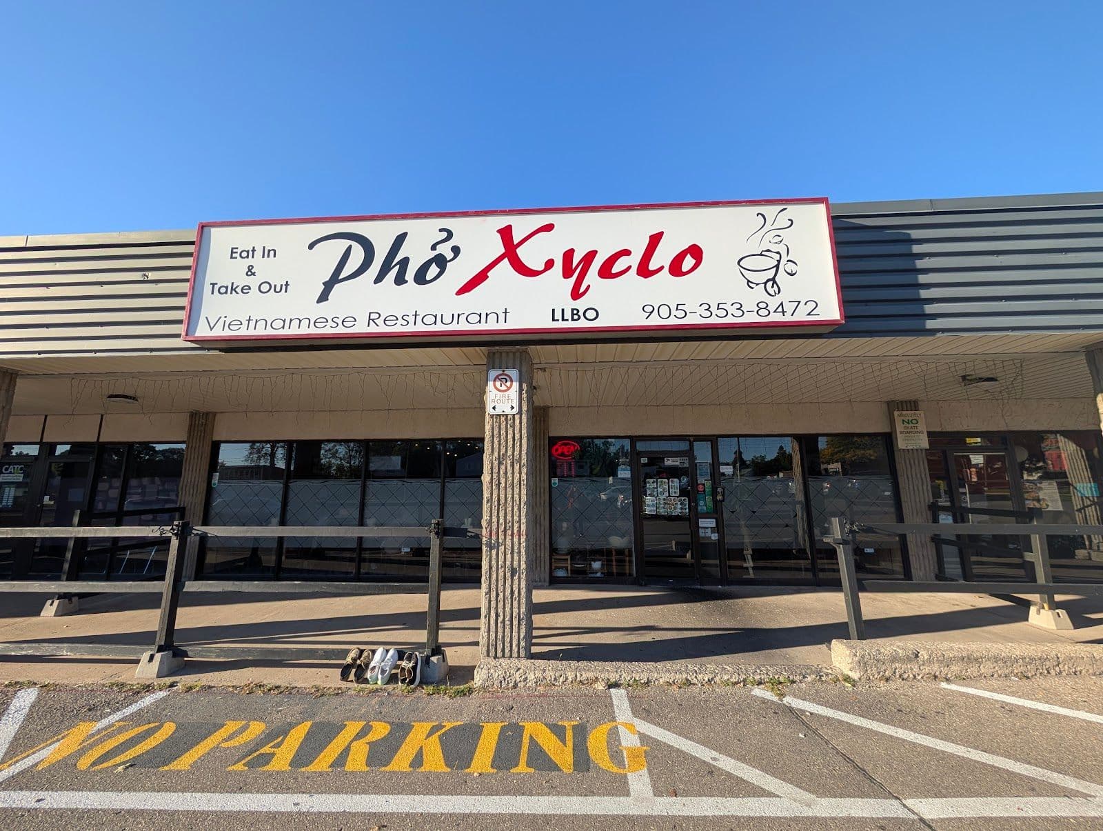 Restaurant team reviewing guest feedback at Pho Xyclo
