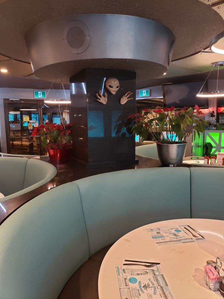 Guests dining at a busy restaurant