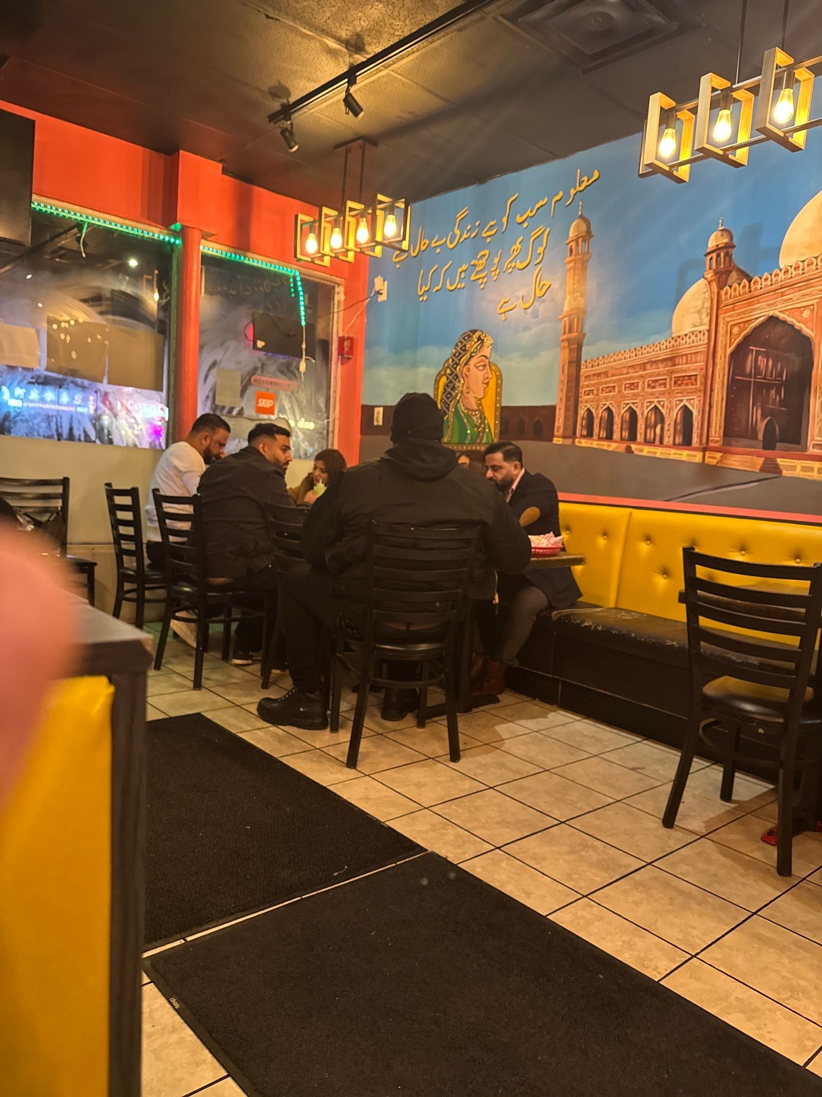Guests dining at a busy restaurant