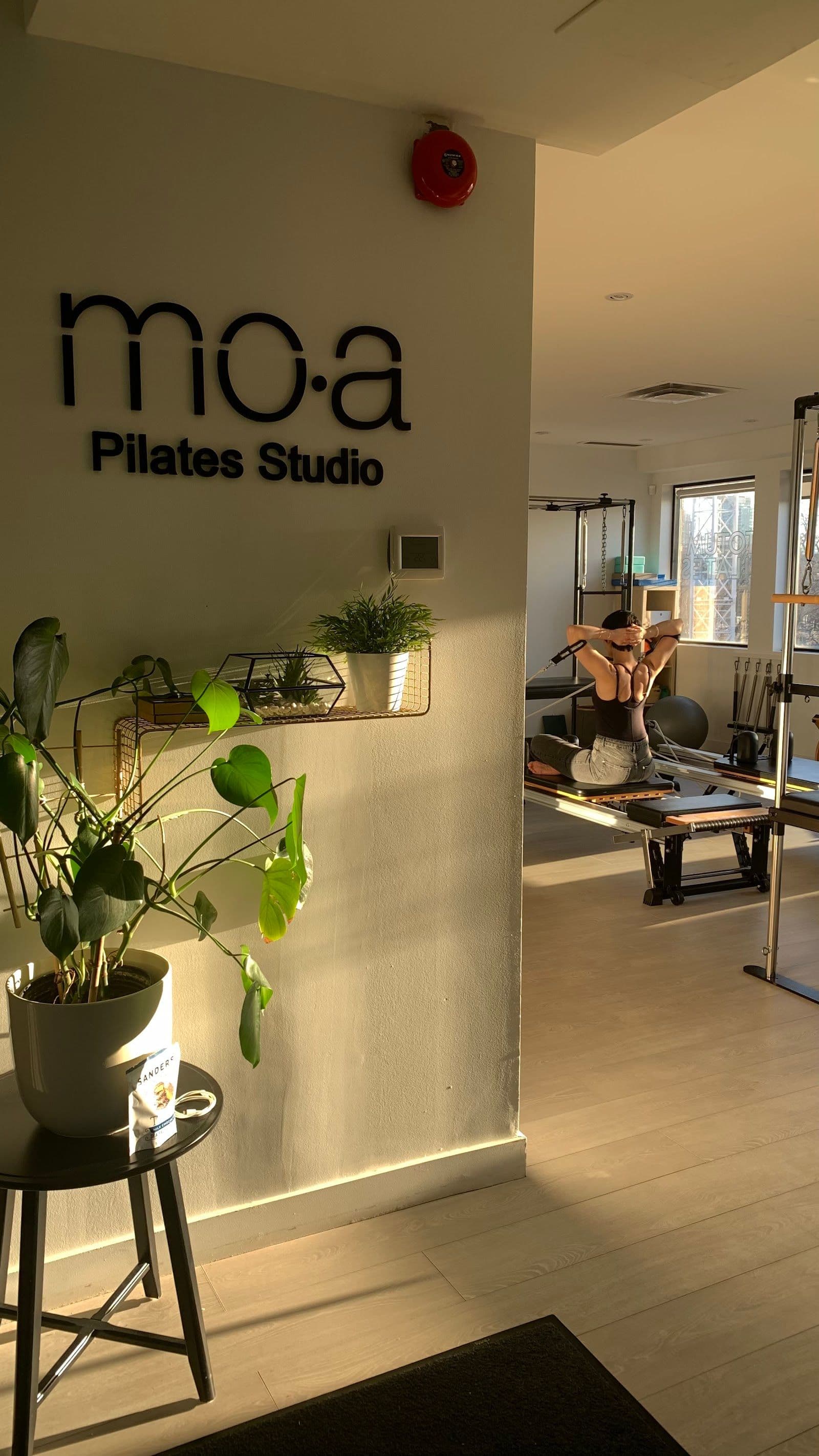 MOA Pilates Studio by adel studio owner reviewing member feedback and Google ratings on a mobile dashboard