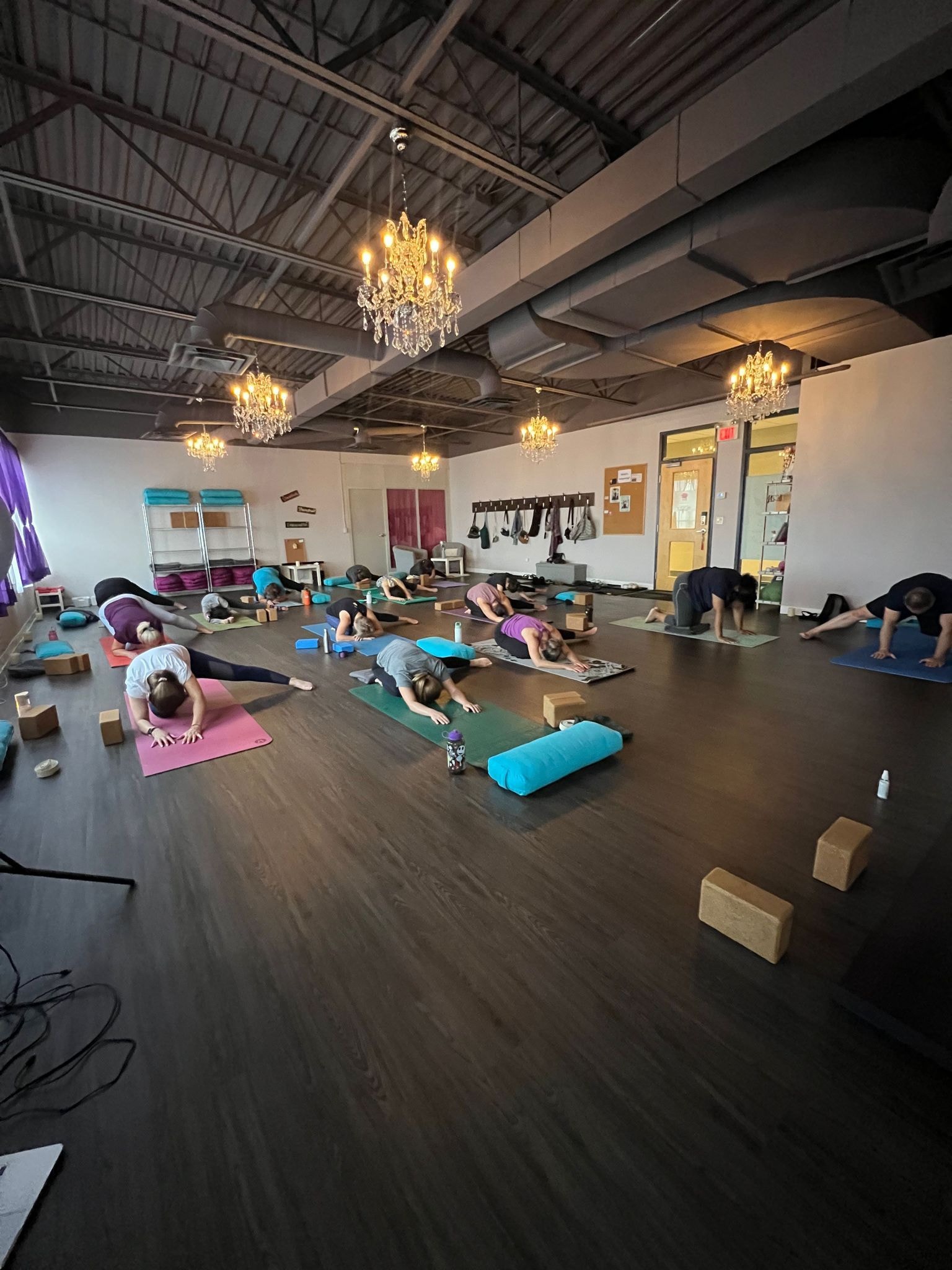 Personal trainer checking Google reviews on her phone at the studio