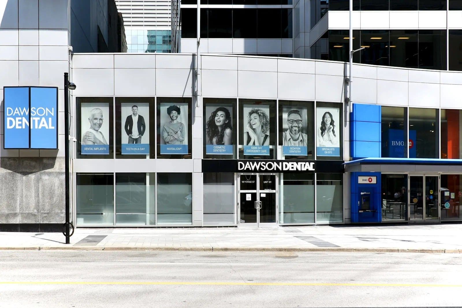 Dawson Dental Toronto Downtown team reviewing patient feedback and Google reviews together at the front desk