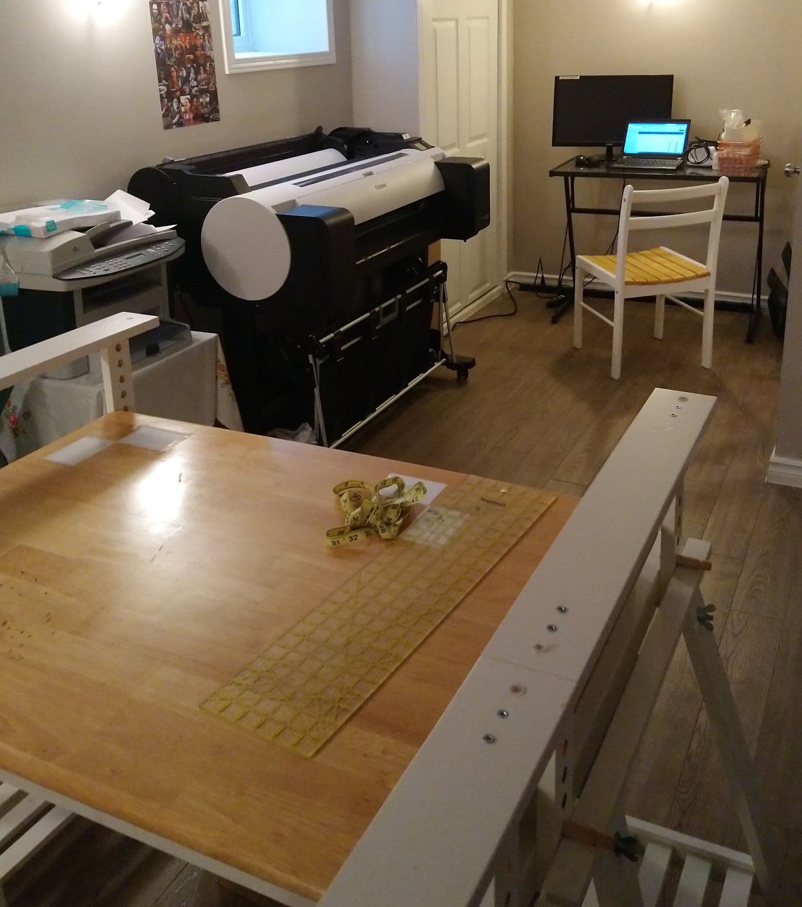 Owner reviewing Google feedback and sewing pattern print orders at Spool & Spindle Printshop