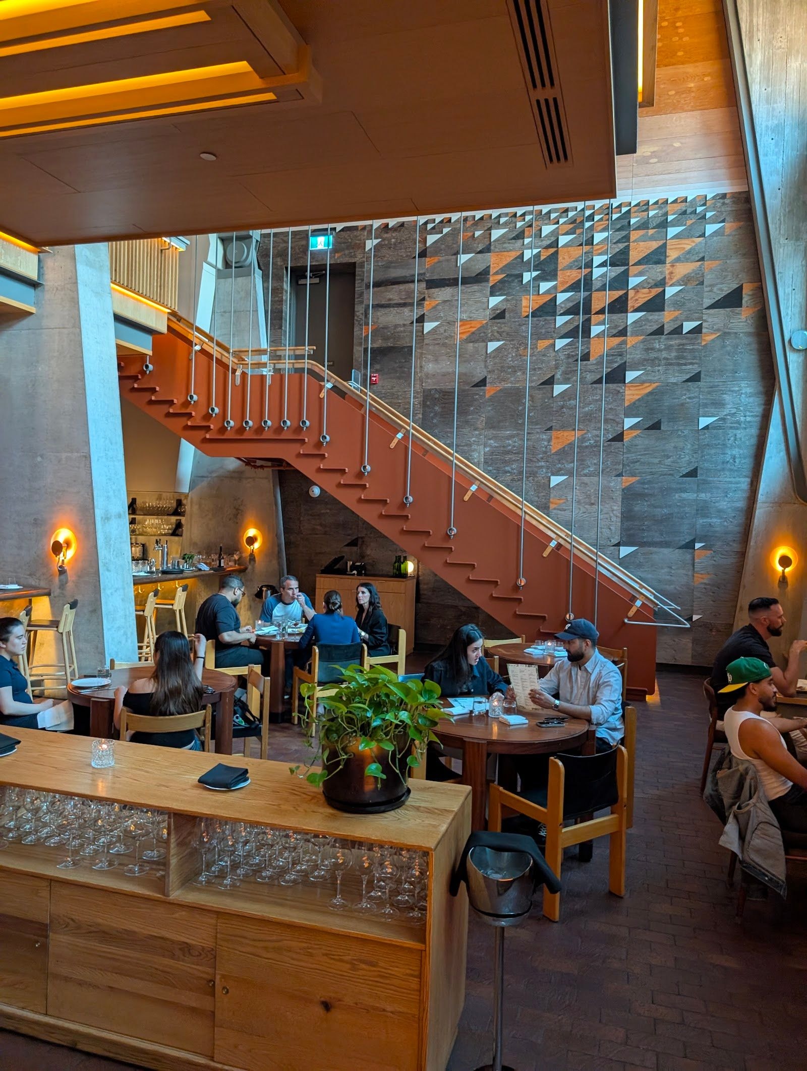 Guests dining at a busy restaurant