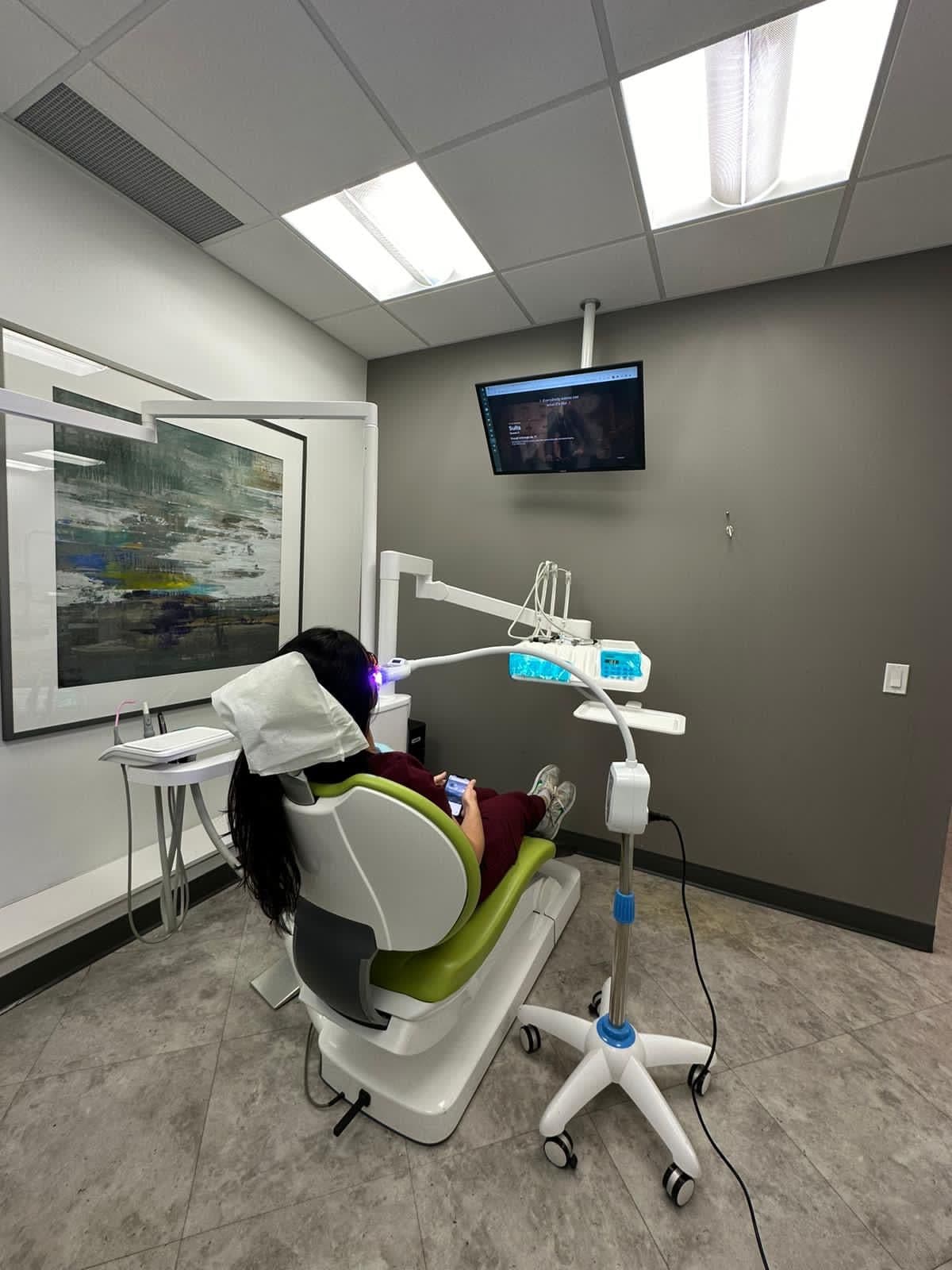 Smile Garden Dental Junction front desk and clinical team reviewing patient feedback together at the Junction clinic