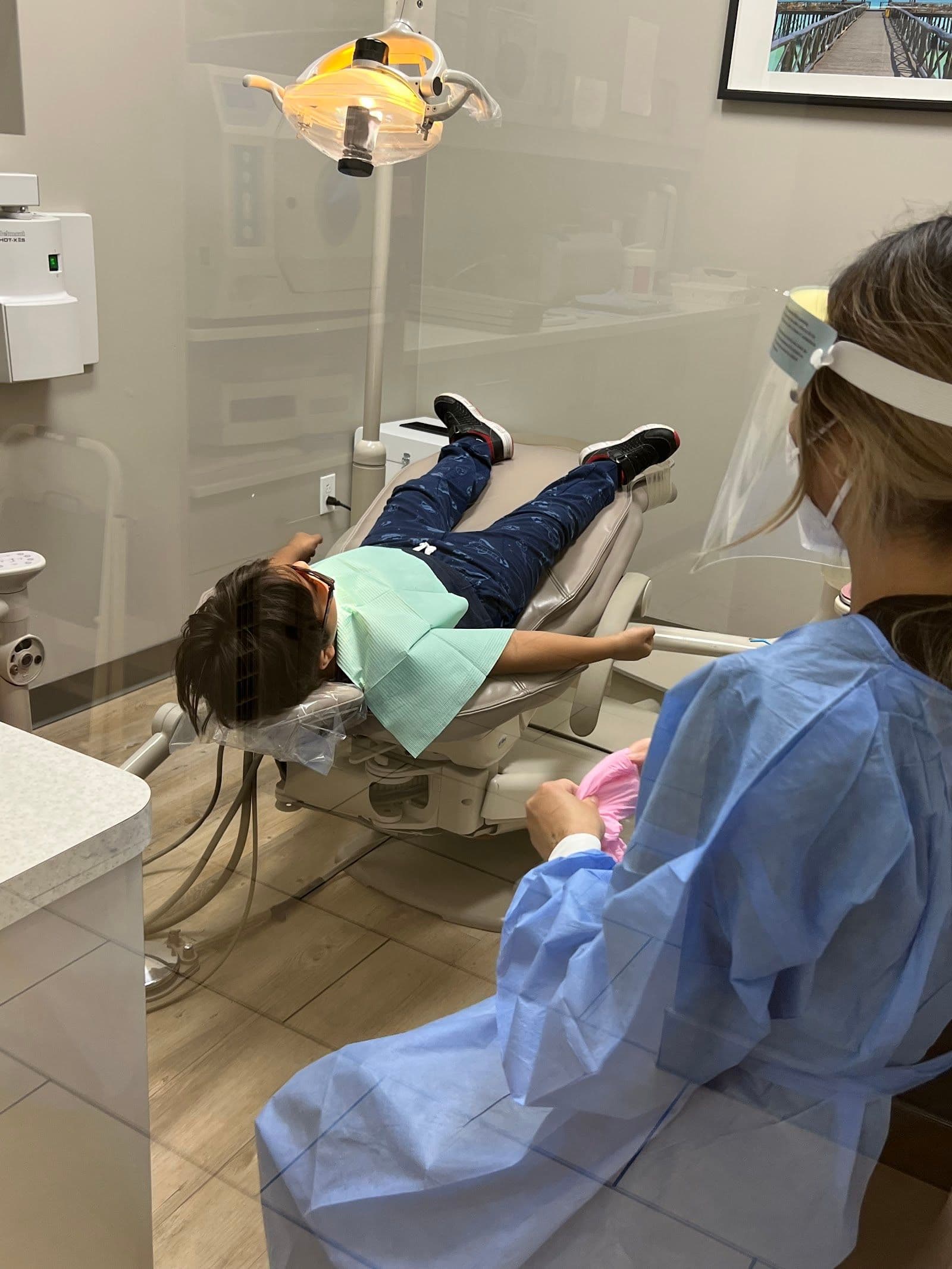 WestClair Dental front desk and clinical team reviewing patient feedback together at their Toronto clinic