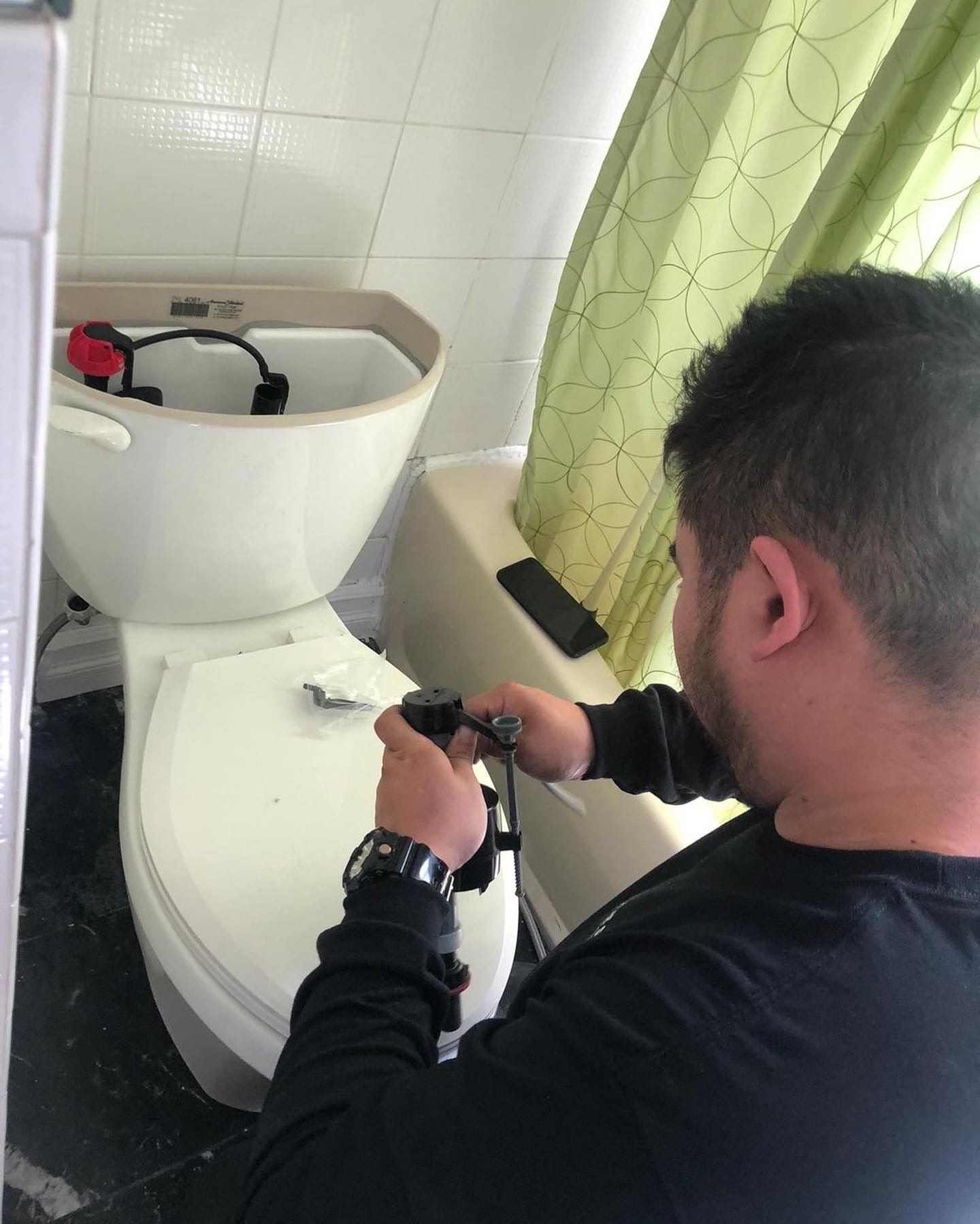 Home services owner reviewing feedback on a laptop