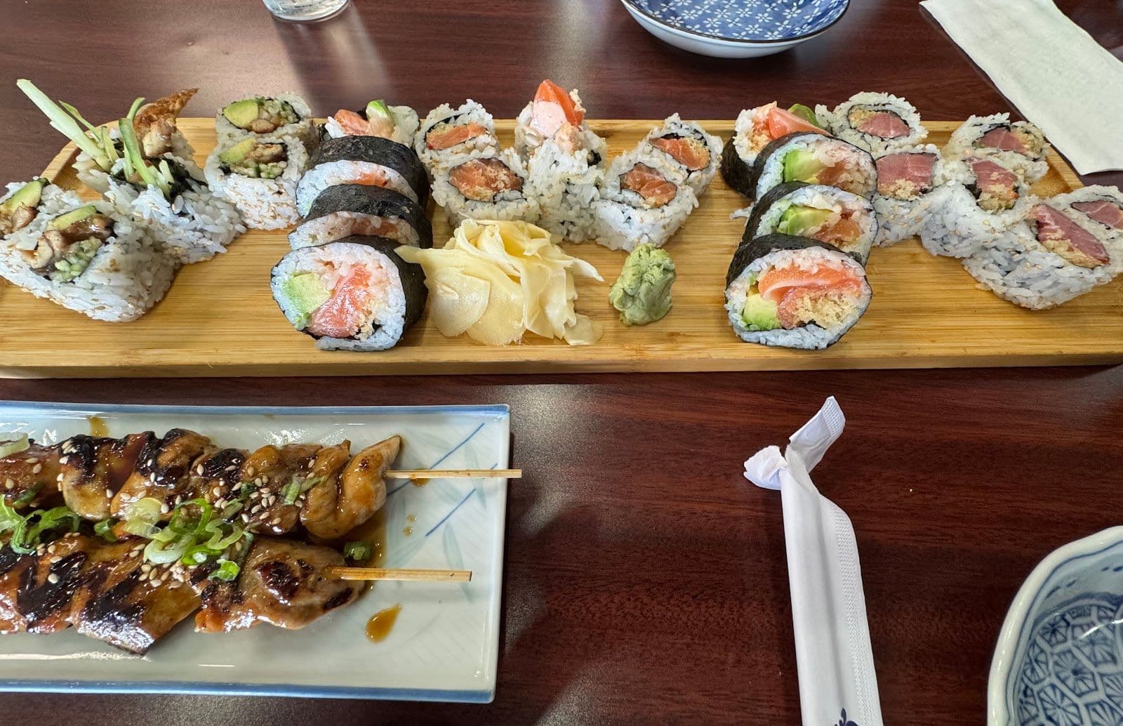 Danny's Sushi owner and team reviewing guest feedback together at their Niagara Falls restaurant