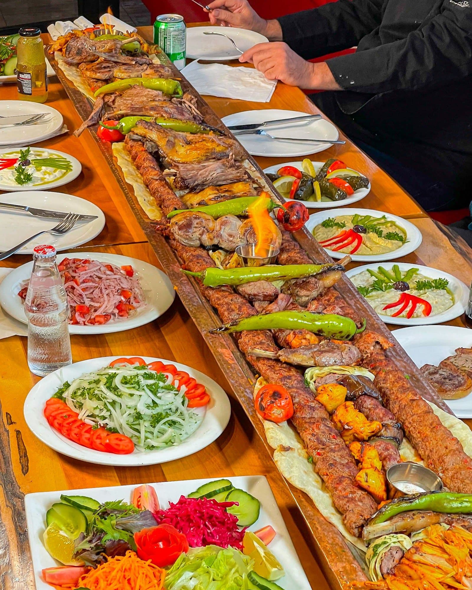 Kebab 49 Turkish Restaurant team reviewing guest feedback together at their Etobicoke dining room