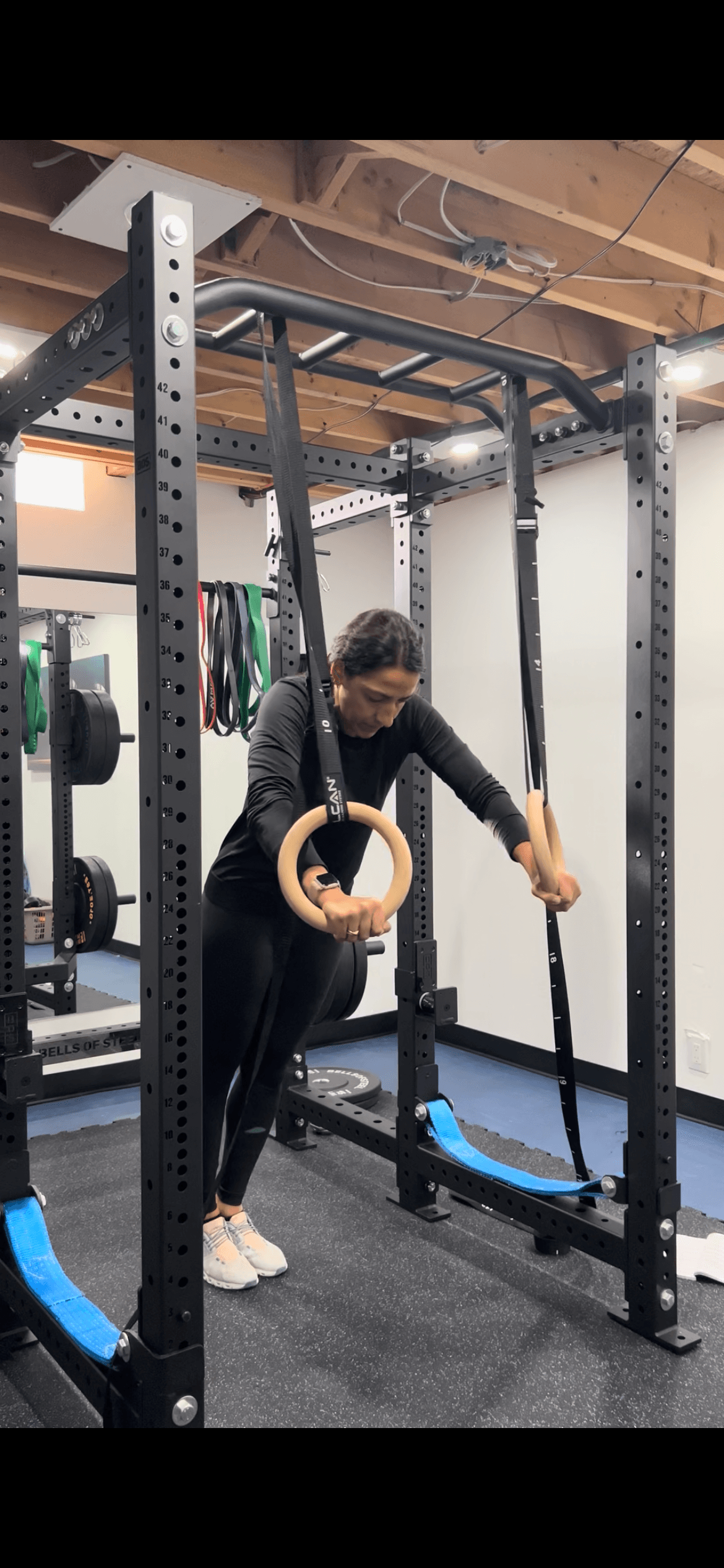 FeelFitLookFit - Personal Training Milton trainer and member reviewing session feedback and progress notes together in the home gym