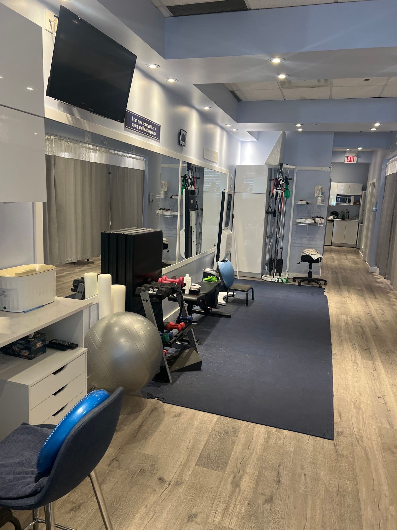 Active Physiotherapy Brampton clinic team reviewing patient feedback and Google reviews together at their Brampton location