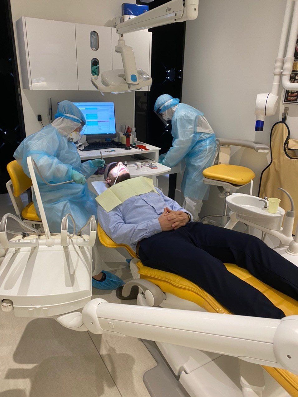 Doctor reviewing patient feedback on a laptop
