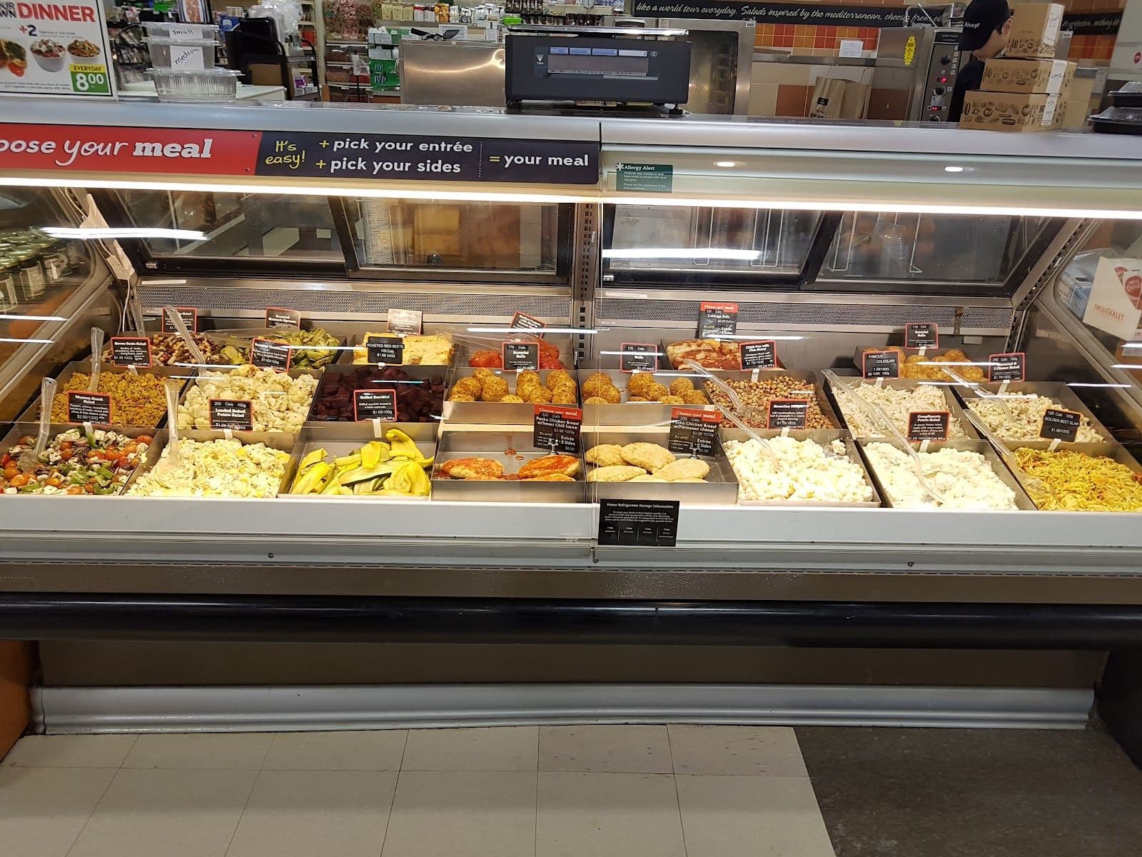 Store manager reviewing guest feedback on a tablet at Sobeys Niagara Falls