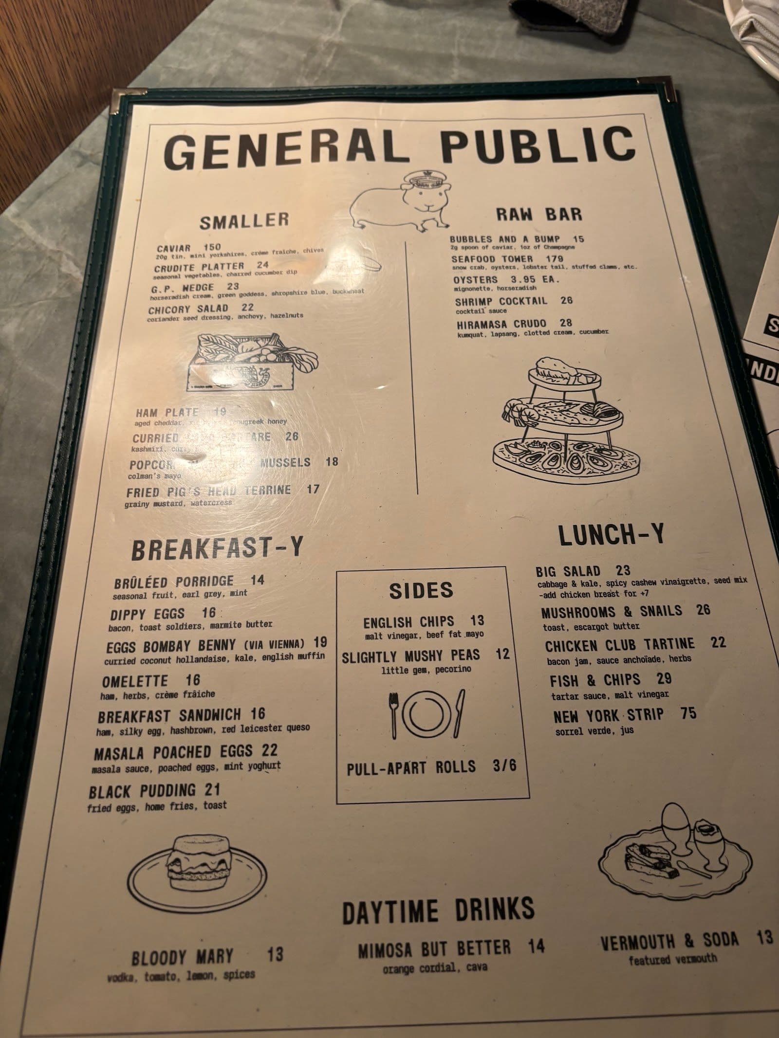General Public Restaurant team reviewing guest feedback and Google reviews together at the restaurant