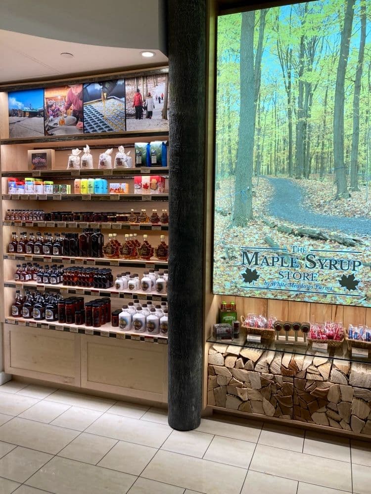 Restaurant team reviewing guest feedback at The Maple Syrup Store by White Meadows Farms
