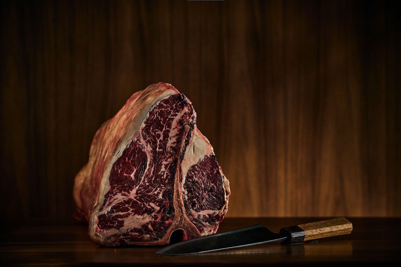 Jacobs & Co. Steakhouse team reviewing guest feedback together at the restaurant