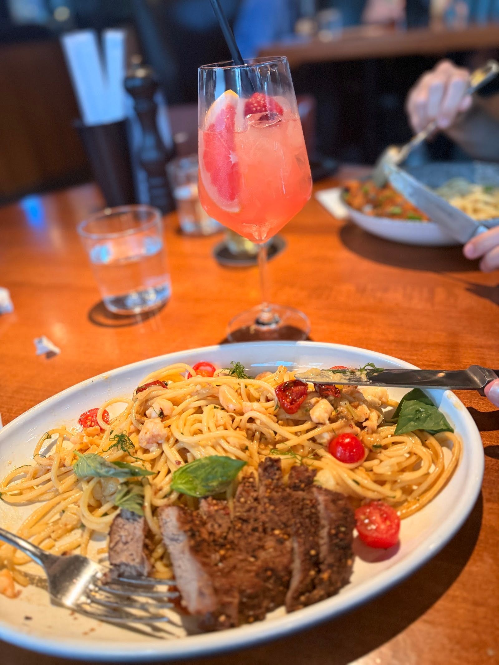Guests dining at a busy restaurant