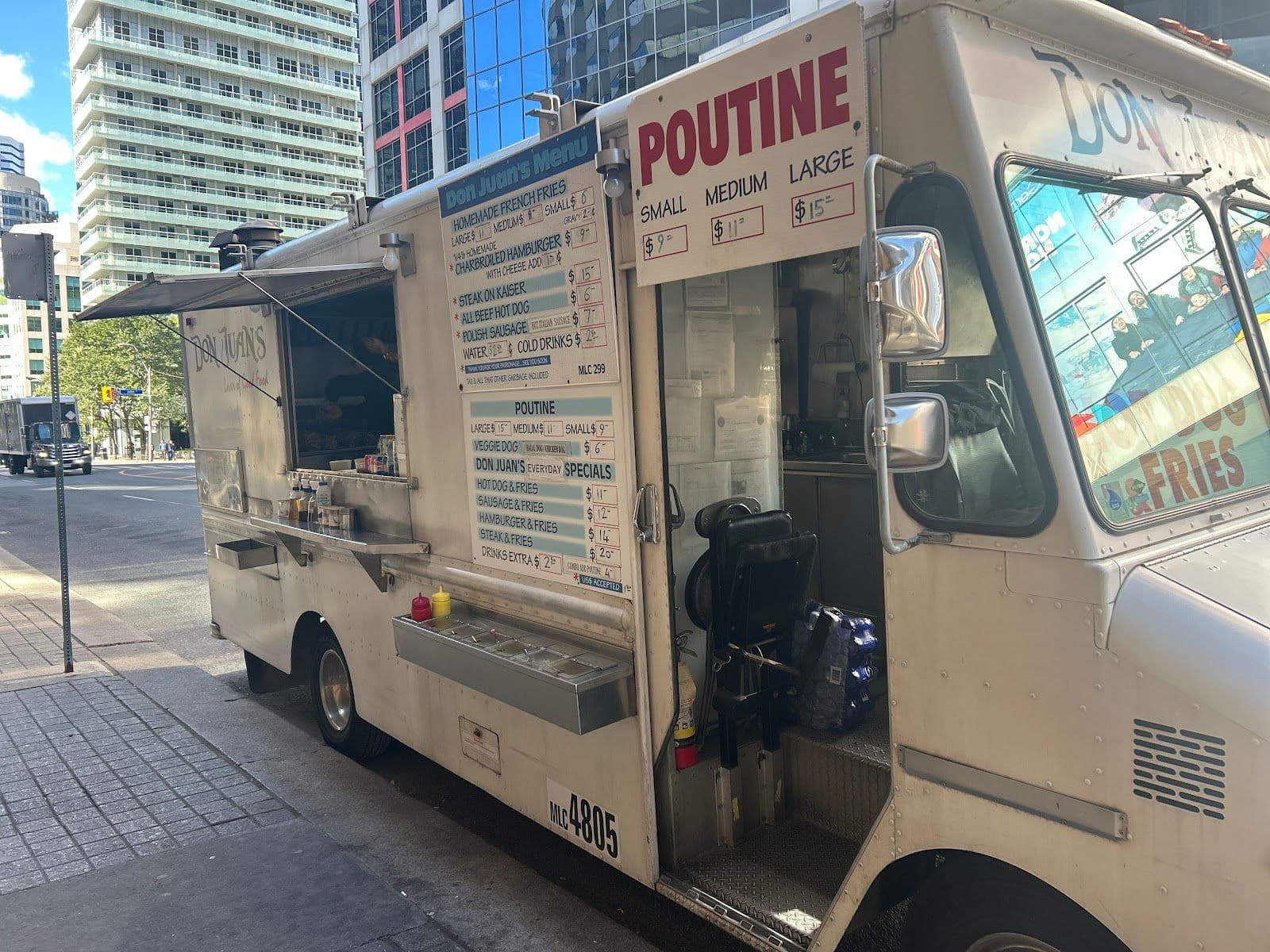 Don Juan's Food truck owner and team reviewing guest feedback and Google reviews on a mobile dashboard