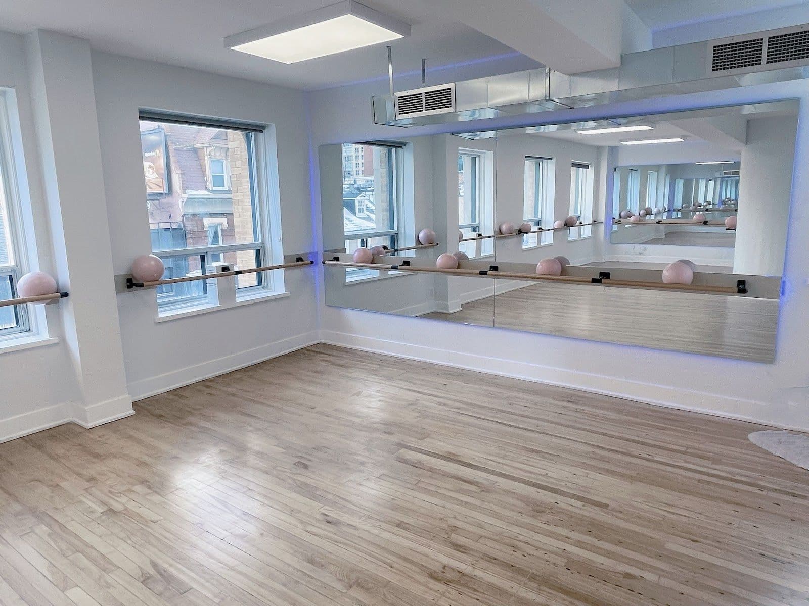 Enjoy Pilates Studio - Downtown owner reviewing member feedback and Google reviews on a mobile dashboard